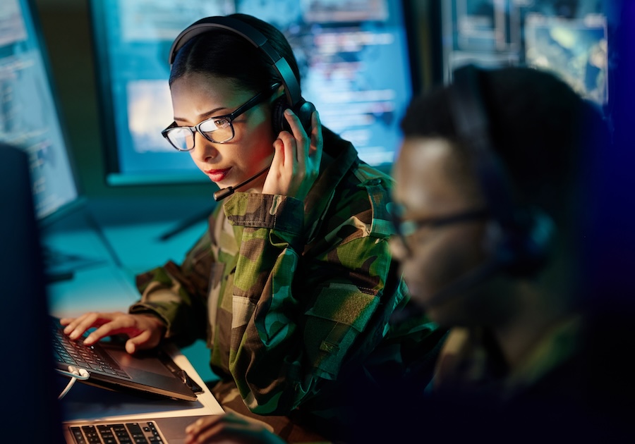 Military control room, headset and woman with communication, computer and technology. Security, glo.