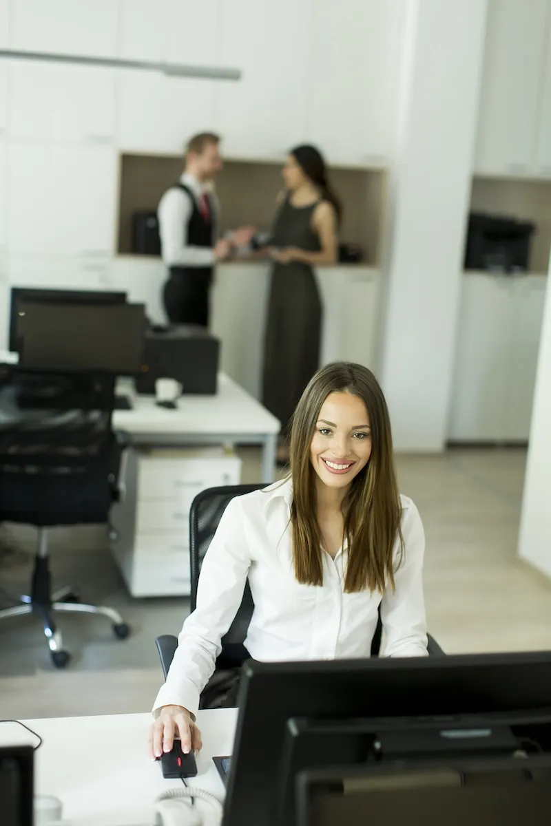 https://concertium.com/wp-content/uploads/2025/05/office_worker_at_computer.webp